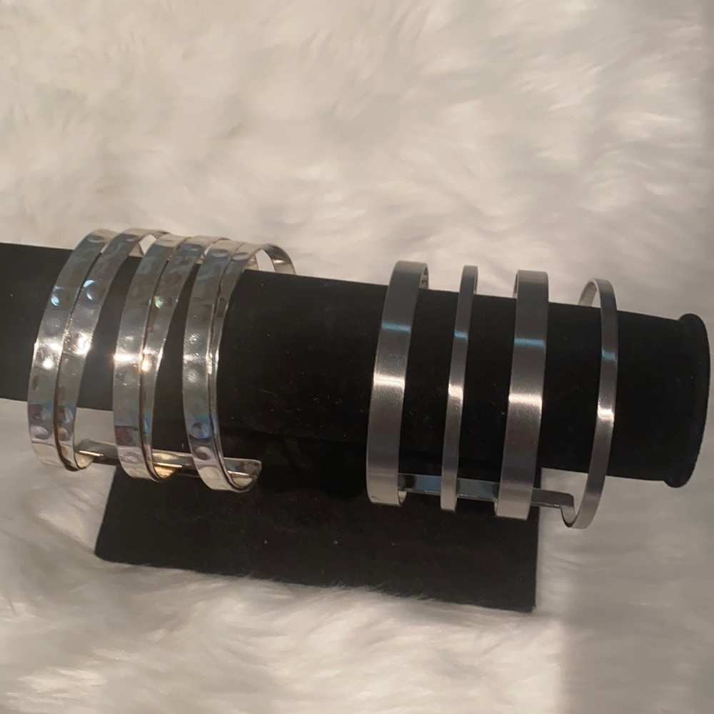 Pair of NEW silver tone cuff bracelets
